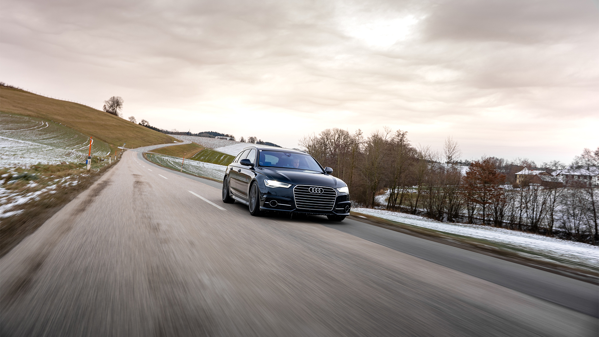 Audi A6 in blue with chrome accents